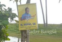 Banner gambar Hipni dengan jargon “Mari Bangkit Bersama Hipni SE” menghiasi pemandangan pelintas