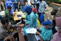  Kapolres Pasaman AKBP Dedi Nur Andriansyah saat menjalani suntik vaksin Covid 19 [HMS]