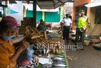 Koramil 08/Rejoso Bersama Forkopimcam Lain Sosialisasi ke Pasar Tradisional Ngopak [IST]