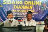 PJ Kepala Desa dan  Sekretaris Desa Sumberejo, saat menjalani sidang pembacaan tuntutan oleh Jaksa Penuntut Umum (JPU) di Pengadilan Tipikor Surabaya dilakukan secara Online [IST]