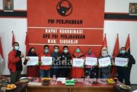 DPC PDI Perjuangan Sidoarjo bersama BPJS Ketenagakerjaan memberikan santunan JKM [IST]