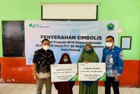 Anggota DPRD Kota Malang, Suryadi menghadiri penyerahan santunan dan program beasiswa pada Tendik dan anaknya