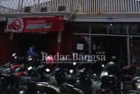Gudang tempat menyimpan barang rampasan di Honda, Jl Arjuno No 117, Surabaya