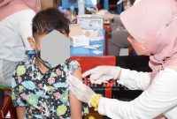 Vaksinasi Ceria covid-19 untuk anak usia 6 hingga 11 tahun jenis vaksin sinovac berjumlah 93.066 dosis, dengan target akan selesai dalam kurun waktu 3-4 minggu. Secara serentak mulai dilaksanakan hari ini, Rabu (15/12/2021) di Kabupaten Lamongan Jawa Timur (Dok Foto: Istimewa Syaiful Anam / RadarBangsa.co.id)