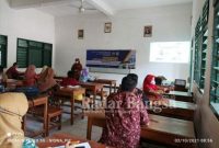 Suasana pelatihan HOTS dan literasi sains bagi guru IPA SMP di Nganjuk oleh Tim PKM Pascasarjana Unesa