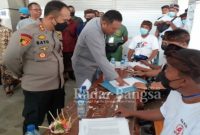 Kapolres Gianyar AKBP I Made Bayu Sutha,  beserta Forkopimda meninjau pelaksanaan Pilkel Serentak di sejumlah TPS, Minggu (16/1) (IST)