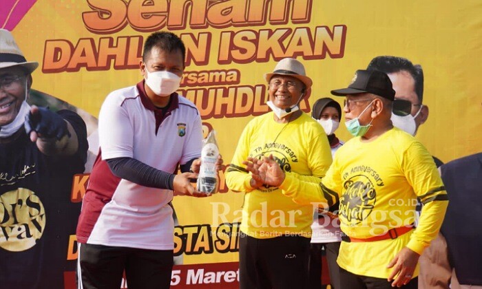 Kapolresta Sidoarjo Kombes Pol. Kusumo Wahyu Bintoro  bersama Dahlan Siska ( IST)