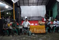 Pemdes Desa Tulungrejo bersama TNI-POLRI dan Nakes saat kegiatan Vaksin (IST)