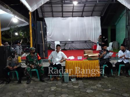 Pemdes Desa Tulungrejo bersama TNI-POLRI dan Nakes saat kegiatan Vaksin (IST)