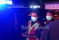 Tersangka Rali Sugiharto saat dikirim ke Lapas Lamongan usai jalani pemeriksaan di kantor Kejakssaan Lamongan (07/04)