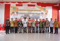  Bupati Pasaman H. Benny Utama dan Wabup Rohul H. Indra Gunawan serta antar sesama kepala OPD kedua daerah saat foto bersama ( Dok Foto IST)