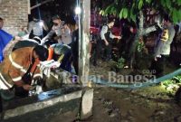 Anggpta Kepolisian saat berada dilokasi banjir (IST)