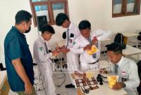 Giat Tim Unesa menggelar Pelatihan Technomarketing pada santri Pesantren Terpadu Darul Ihsan Wajak, Malang