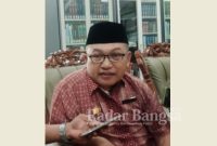 Kepala sekolah SMP Negeri 3 Lumajang, Muhammad Suhudi MPd, ketika ditemui di ruangan kerjanya, Selasa (24/1). (Dok Riyaman/Radarbangsa.co.id)