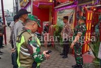 Sinergi TNI -Polri memberi rasa aman pada peringatan Imlek di Kabupaten Sidoarjo .Sabtu (21/1/2023) (Foto : Rino Tutuko )