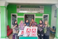 Ketua Harian Laskar Merah Putih Kabupaten Pringsewu Musriyadi saat salurkan bantuan di Ponpes Baitul Qur'an Podosari, Pringsewu, Senin 16/01/2023
(Dok.Darmawan/Radar Bangsa)