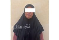 Tersangka UMU diamankan di Polres Lamongan (Dok foto Polres Lamongan for RadarBangsa.co.id)