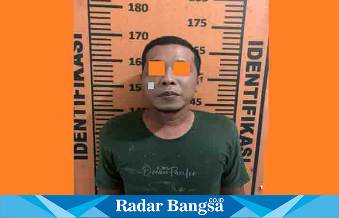 Teduga Pelaku IZ (35) warga Desa Pajangan Kecamatan Sukodadi Kabupaten Lamongan diamankan di Polres Lamongan (Dok  foto Polres Lamongan for RadarBangsa.co.id)