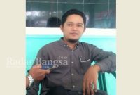 Kepala Desa Karanganom, Fathur Rozi, S.Psi, ketika dikonfirmasi di kantor Desanya, Selasa (28/2). (Dok Riyaman/Radarbangsa.co.id)