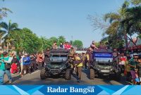 HUT ke 78 TNI, Kodim 0822 Bondowoso menggelar JJS ( Jalan Jalan Sehat ) bersama Forkopimda dan ribuan masyarakat Bondowoso. Minggu (15/10/2023)