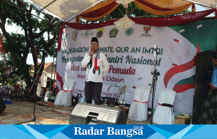 Sambutan ketua panitia pelaksana kegiatan kecamatan Cidaun AAN Gunawan. S. Pd, di laksanakan satu pintu (HSN, MTQ, memperingati Hari Sumpah Pemuda) tahun 2023. (Dok photo RadarBangsa.co.id/AE Nasution)