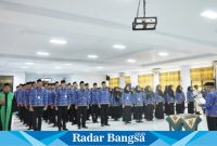 Ket Foto : saat pelaksanaan pengambilan sumpah/janji PNS, serta penyerahan SK PNS terhadap 112 PNS formasi 2021 dan 2022, di Graha Nagara Bhakti Kantor BKD Kabupaten Lumajang, Jumat pagi (17/11/2023). (Dok Kominfo Lmj, for Riyaman)