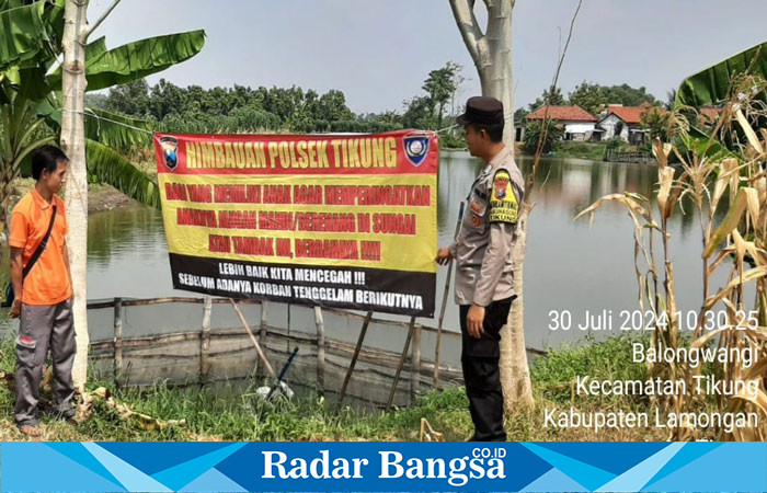 Polsek Tikung s himbauan serta pemasangan banner larangan bermain di waduk