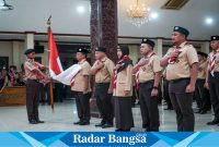 Ketua Kwartir Cabang Lamongan, Moh. Nalikan saat upacara ulang janji Pramuka ke-63 pada Selasa (13/8) di Pendopo Lokatantra. (ist)