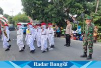 Kanit Reskrim Polsek Tikung IPTU Sono, S.H saat mengamankan kegiatan gerak jalan (IST)