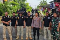 Kanit Reskrim Polsek Tikung bersama Pamter saat pengamanan pengambilan sabuk putih (IST)