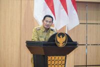 Bupati Lamongan Yuhronur Efendi menyampaikan sambutan dalam rapat paripurna persetujuan tujuh Raperda tahun anggaran 2025 di ruang rapat DPRD Lamongan, Senin (30/6/2025). | Dok foto  Ho/RadarBangsa