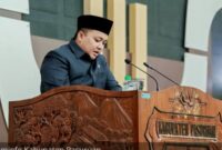 Bupati Pasuruan Rusdi Sutejo saat menyampaikan jawaban atas pandangan fraksi-fraksi DPRD dalam Sidang Paripurna pembahasan P-APBD 2025, Senin (21/7/2025). | Foto Dok Ho/RadarBangsa