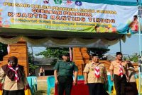 Kapolsek Tikung AKP Anang Purwo Widodo (dua dari kiri) menghadiri pembukaan Perkemahan Satu Hari (Persari) Calon Pramuka Siaga Garuda Kwartir Ranting Tikung Tahun 2025 di Lapangan Singolodro, Desa Bakalanpule, Lamongan, Selasa (26/8/2025). (Foto Dok Ho/RadarBangsa.co.id)