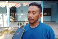 Ketua Kelompok Tani (Poktan) Sumber Urip, Tarim, saat memberikan klarifikasi terkait isu penguasaan proyek jalan usaha tani di Kantor UPT Pertanian Tikung, Lamongan, Jumat (15/8/2025) (Foto Dok Ho/RadarBangsa.co.id)
