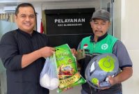 Pegawai pemerintah dan warga memanfaatkan layanan ojol untuk belanja di warung rakyat dan pasar tradisional Banyuwangi, Selasa (9/9/2025). (Foto Dok Ho/RadarBangsa.co.id)