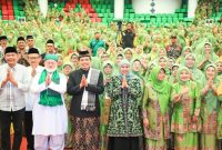 Gubernur Jawa Timur Khofifah Indar Parawansa menghadiri Pengajian Maulid Nabi Muhammad SAW sekaligus Pelantikan PAC dan Ranting Muslimat NU se-Kota Malang di Universitas Islam Malang (Unisma), Minggu (7/9/2025). (Foto Dok Ho/RadarBangsa.co.id)