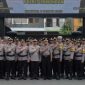 Jajaran anggota Polres Lamongan mengikuti upacara kenaikan pangkat pengabdian di halaman Mapolres Lamongan, Senin (6/10/2025) (Foto Dok Ho/RadarBangsa.co.id)