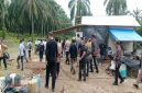 Tim penyidik Unit Tipidter Polres Asahan bersama BPN melakukan pemeriksaan objek tanah HGU milik PT BSP Tbk Kisaran di Divisi 2 Kuala Puasa Estate, Kecamatan Tinggi Raja, Kabupaten Asahan. (Foto: Joko)