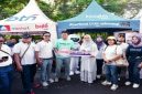 Bupati Banyuwangi Ipuk Fiestiandani menyaksikan akad massal KPR bersubsidi bagi masyarakat berpenghasilan rendah di area Car Free Day, Jalan Ahmad Yani, Banyuwangi, Minggu (19/10/2025). (Foto Dok Ho/RadarBangsa.co.id)