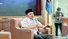 Bupati Pasuruan Rusdi Sutejo saat menyampaikan sambutan dalam Dialog Publik BEM Pasuruan Raya di Auditorium Mpu Sindok, Sabtu (18/10/2025). (Foto Dok Ho/Zaky RadarBangsa.co.id)