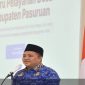 Bupati Pasuruan Rusdi Sutejo menutup kegiatan Bimtek Tata Naskah Dinas Elektronik sekaligus meluncurkan aplikasi SAPA WARGA sebagai langkah awal penerapan program desa digital di Kabupaten Pasuruan, Jumat (17/10/2025). (Foto Dok Ho/RadarBangsa.co.id)