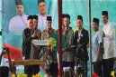 Kapolsek Tikung AKP Anang Purwo Widodo S.H. menghadiri peringatan Hari Santri Nasional 2025 di Perumahan Tikung Kota Baru, Lamongan, Jumat (24/10/2025). (Foto Dok Ho/RadarBangsa.co.id)