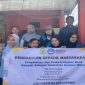 Mahasiswa Universitas Semarang memberikan pelatihan pencatatan digital hasil pengelolaan bank sampah kepada warga Kampung Kepatihan, Kelurahan Bangunharjo, Semarang Tengah, Sabtu (12/10/2025). (Foto Dok Ho/RadarBangsa.co.id)