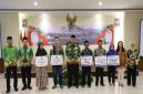 Pemkab Pasuruan serahkan BLT DBHCHT 2025 di Hotel Tanjung Prigen. (Foto Dok Ho/RadarBangsa.co.id)