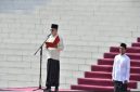 Wakil Bupati Pasuruan, Shobih Asrori, memimpin apel peringatan Hari Santri Nasional 2025 di halaman Kantor Bupati Pasuruan, Rabu (22/10/2025). (Foto Dok Ho/RadarBangsa.co.id)