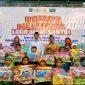 Wakil Bupati Pasuruan, KH Shobih Asrori (tengah), berfoto bersama para peserta Lomba Mewarnai dalam rangka peringatan Hari Santri Nasional 2025 di GOR Sasana Krida Anoraga, Raci, Bangil, Kamis (16/10/2025). (Foto Dok Ho/RadarBangsa.co.id)