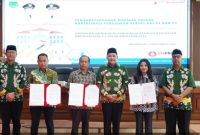Penandatanganan Kontrak Payung Konsolidasi Pengadaan Kertas HVS Pemkab Pasuruan. (Foto Dok Ho/RadarBangsa.co.id)