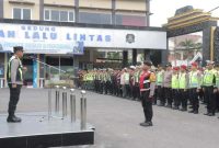 Kapolres Lamongan AKBP Agus Dwi Suryanto memimpin Apel Kesiapan Pengamanan Malam Pergantian Tahun Baru 2026 di Mapolres Lamongan. (Foto Dok Ho/RadarBangsa.co.id)