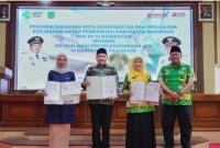 Bupati Pasuruan Rusdi Sutejo usai penandatanganan Nota Kesepakatan UHC bersama BPJS Kesehatan di Auditorium Mpu Sindok. Foto Dok Ho/RadarBangsa.co.id