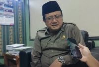 Ketua DPRD Lamongan Moh. Fredy Wahyudi saat diwawancarai awak media terkait pelanggaran pembangunan perumahan. (Foto Dok Ho/RadarBangsa.co.id)